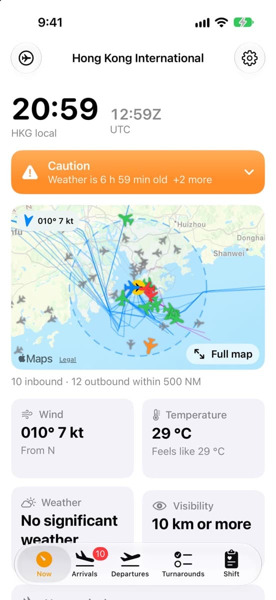 GroundKit Now screen at Hong Kong: local and UTC clocks, a Caution ramp status banner, the airspace map and wind and temperature tiles